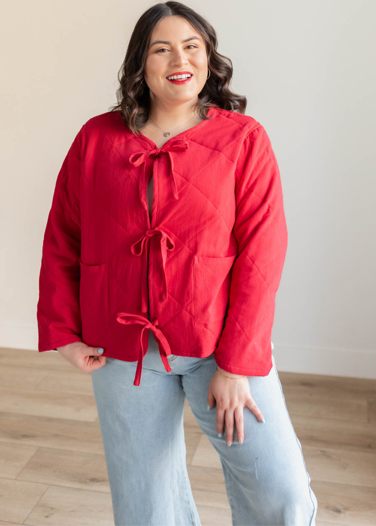 Long sleeve red quilted tie jacket with front pockets in plus size