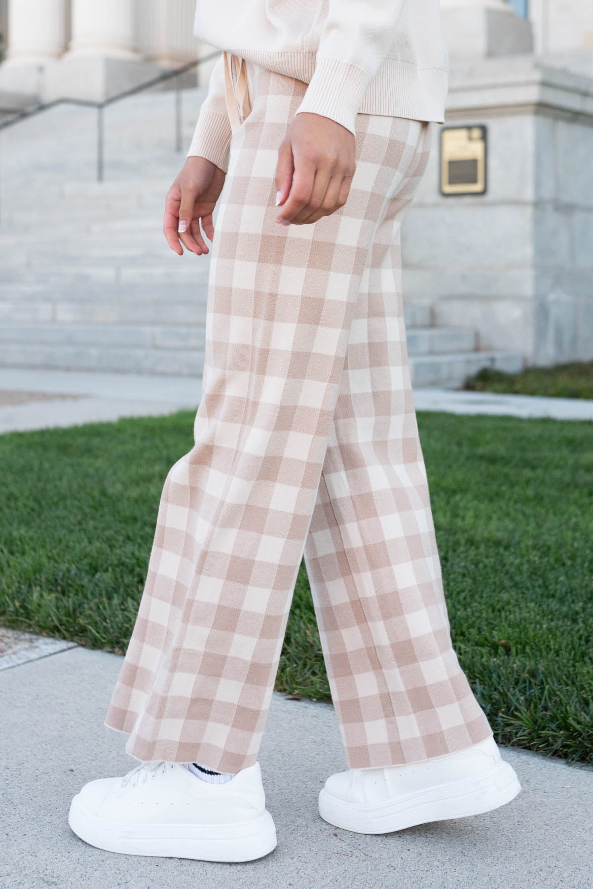 Side view of the gingham sweater pants