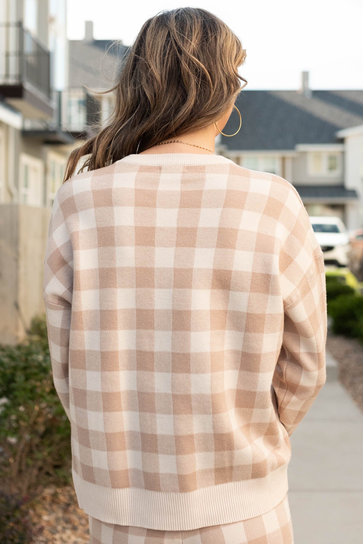 Back view of the ivory sweater 