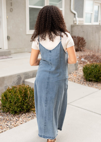 Back view of the denim blue overall dress