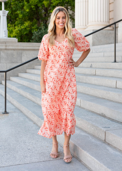 Peach floral tiered dress with short sleeves