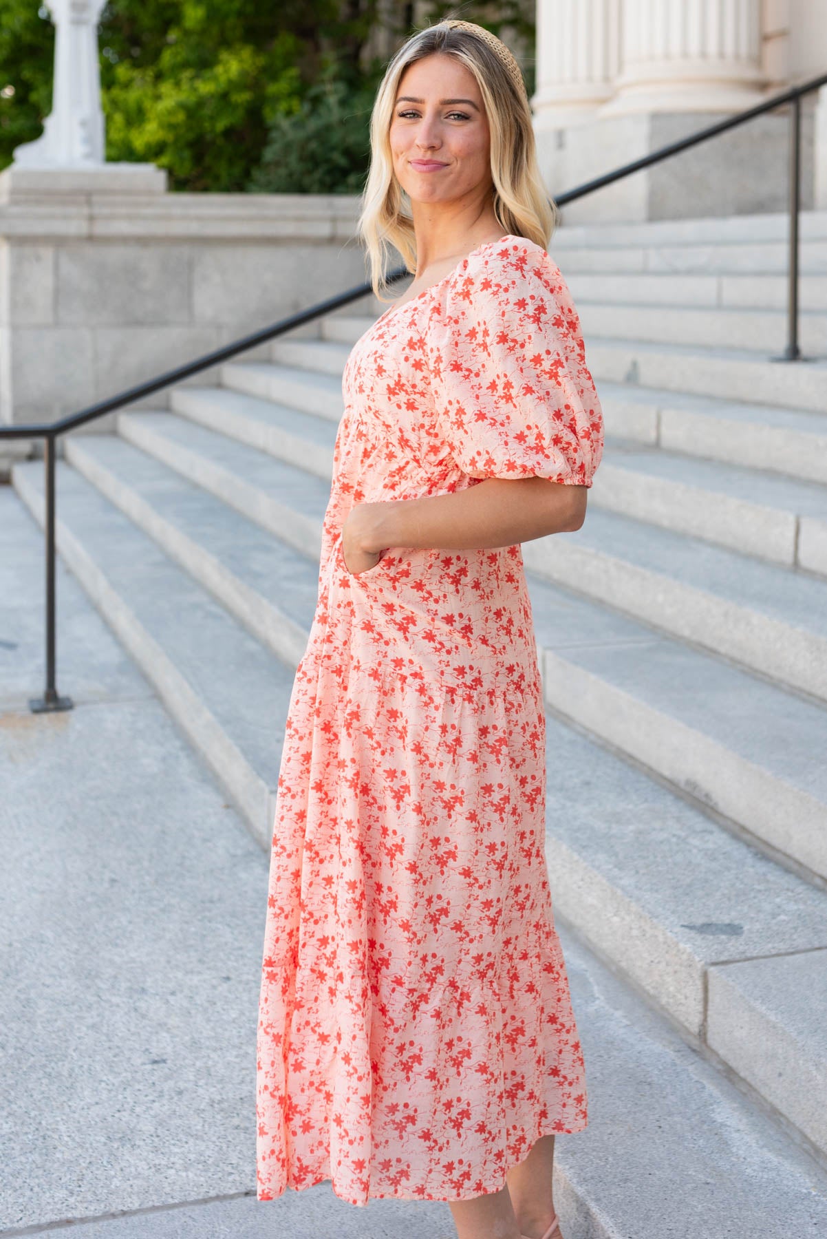 Side view of the peach floral tiered dress