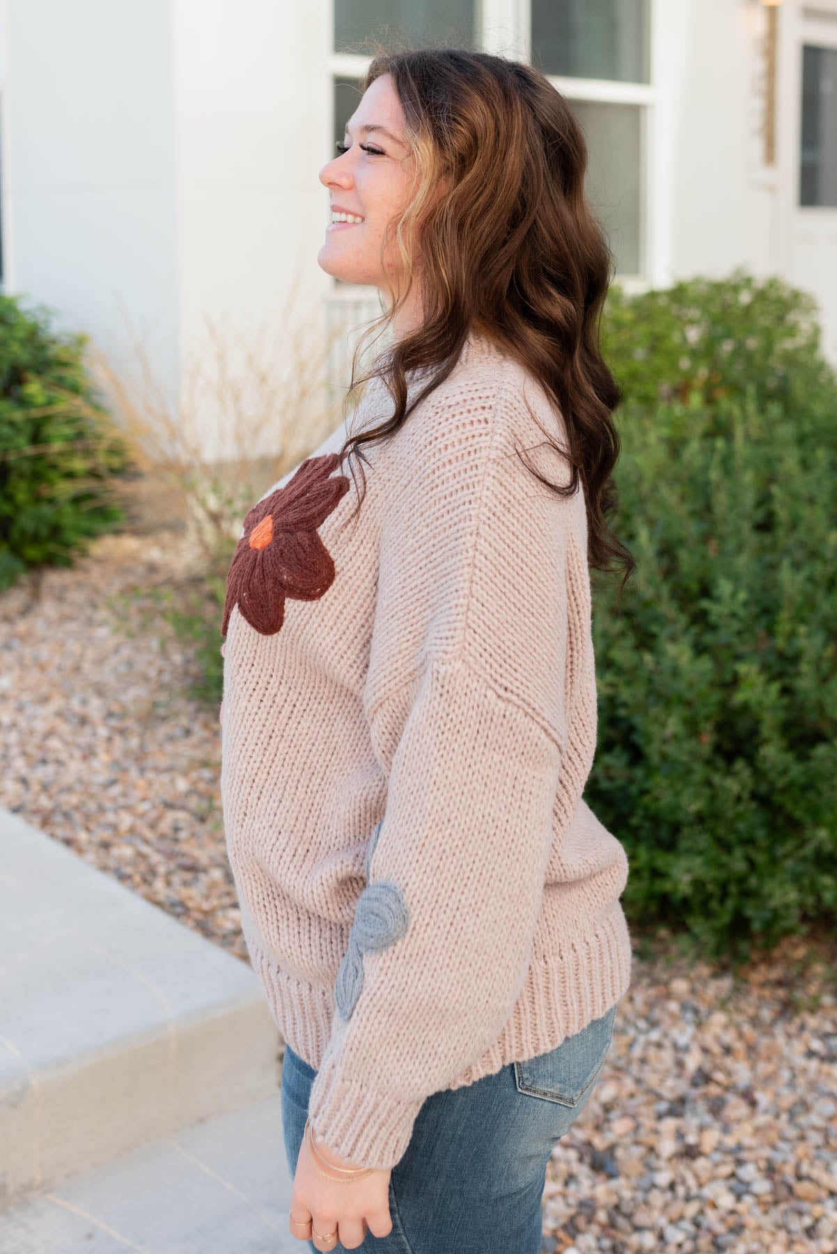 Side view of the natural flower sweater in plus size