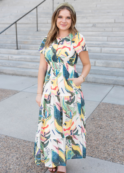 Green tropical print dress with pockets