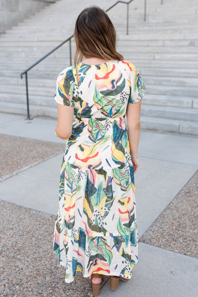 Back view of the green tropical print dress