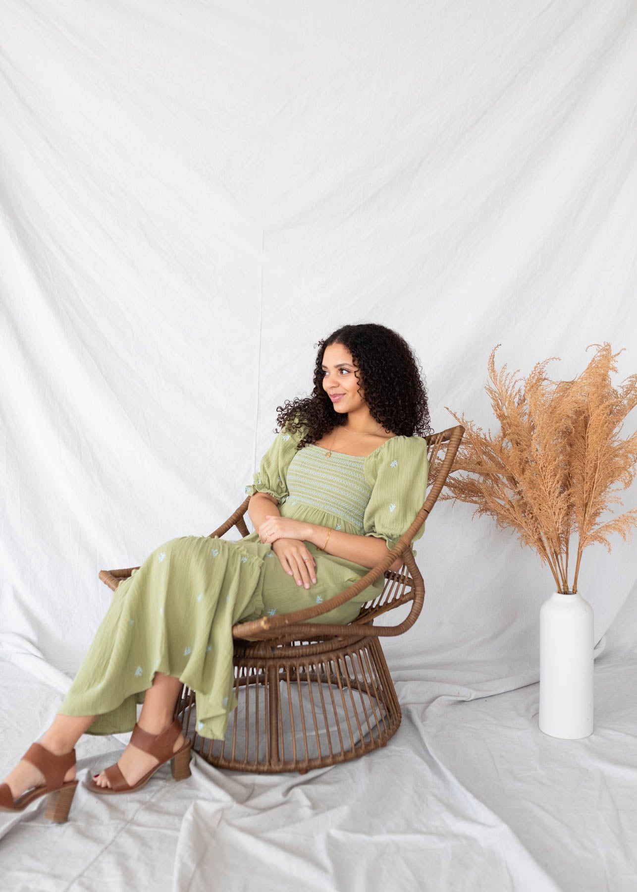 Front view of the short sleeve green floral embroidered dress