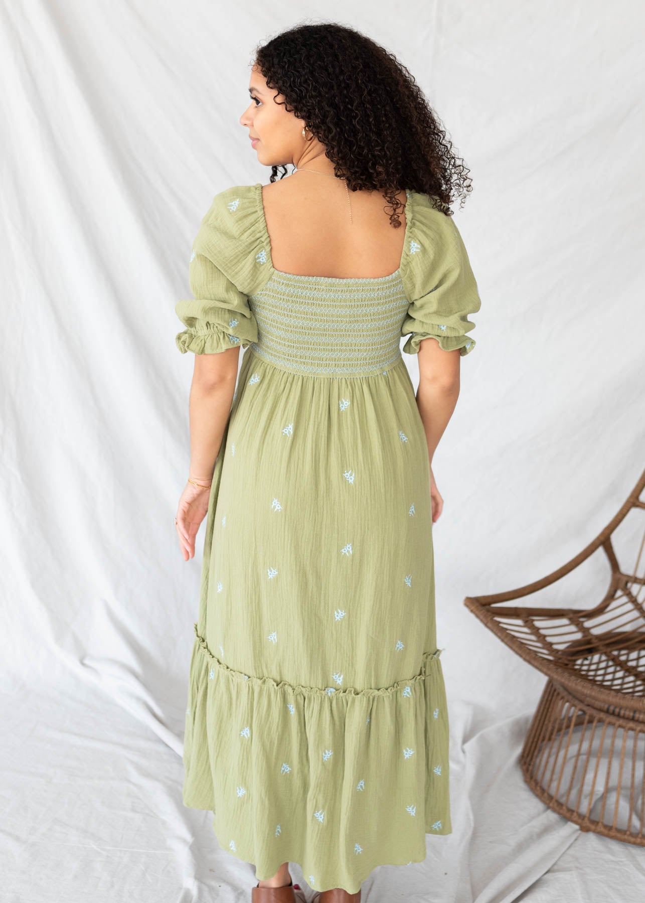 Back view of the green floral embroidered dress