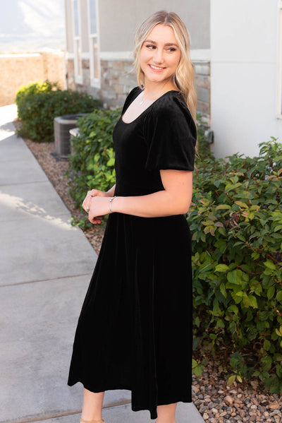 Side view of the black velvet dress