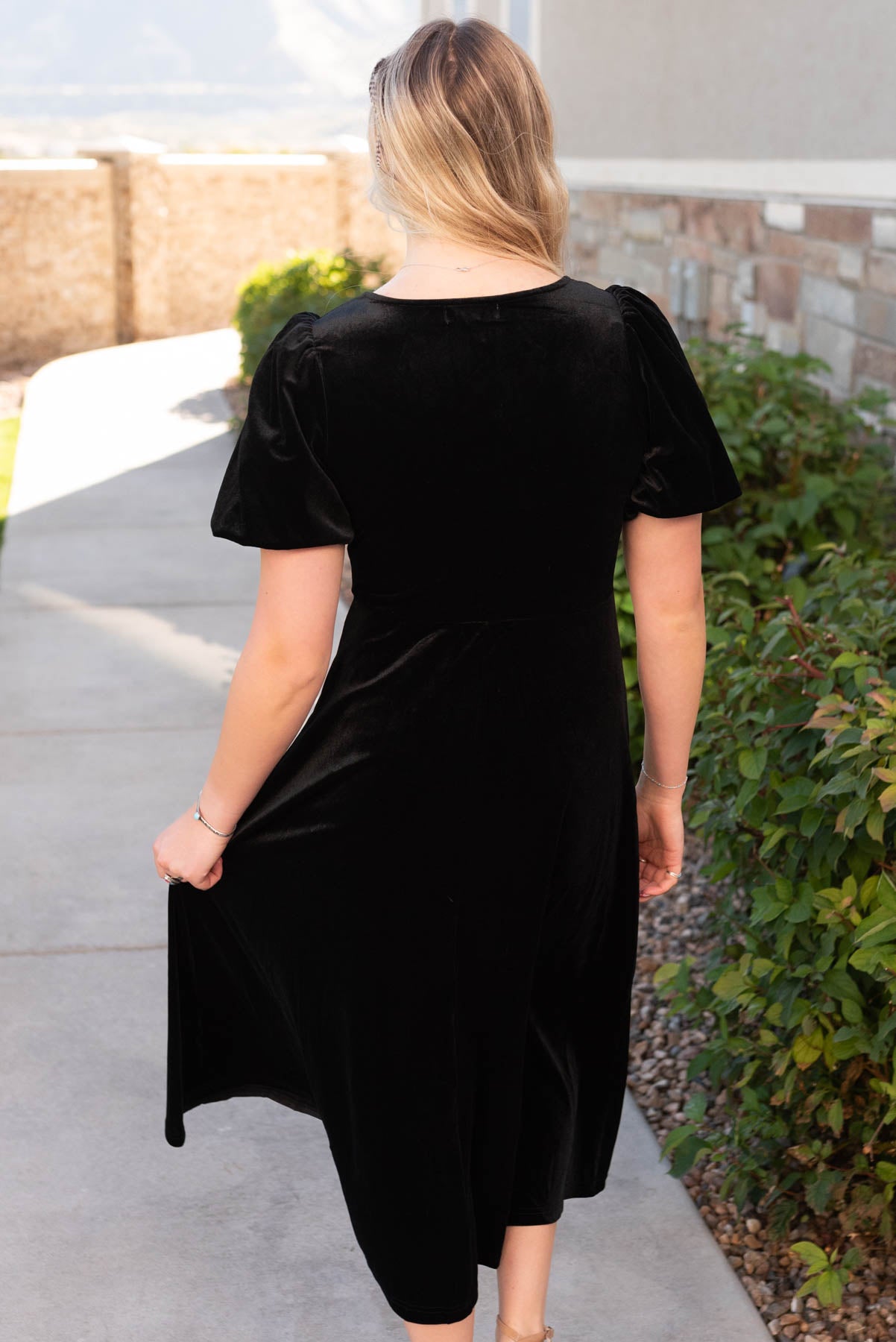 Back view of the black velvet dress