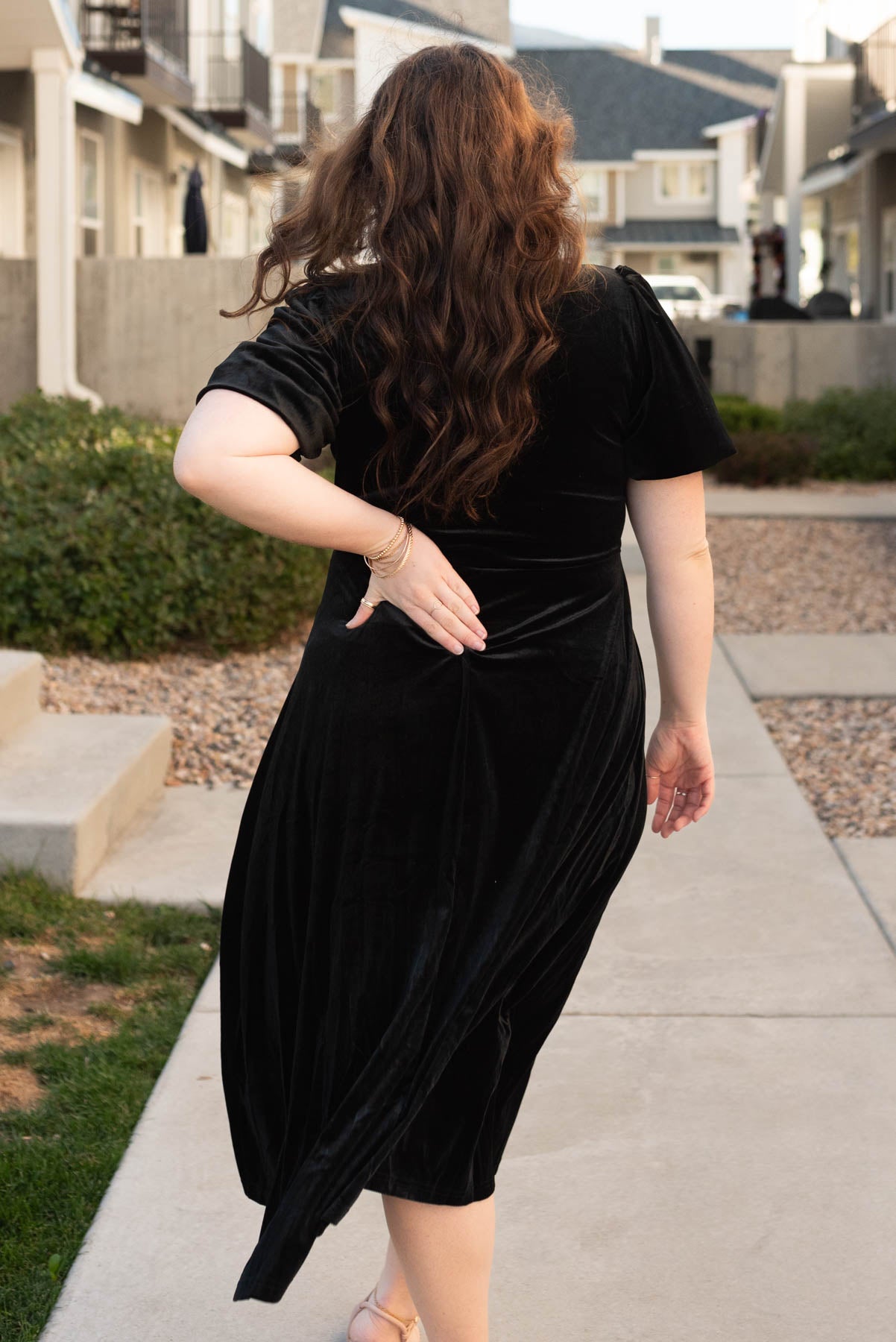 Back view of the black velvet dress in plus size