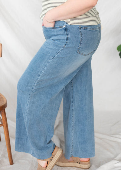 Side view of the washed denim pants