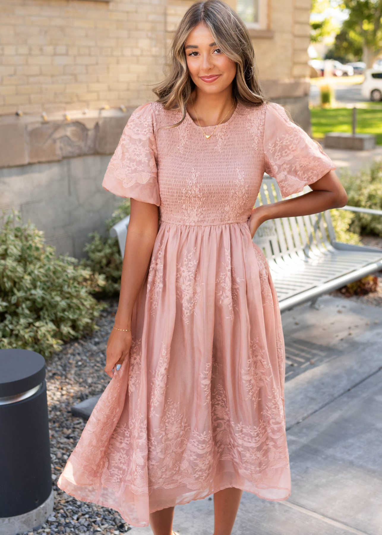 Smocked bodiceon the dusty pink embroidered dress