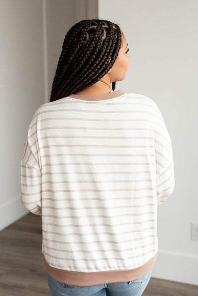 Back view of the mocha stripe long sleeve top