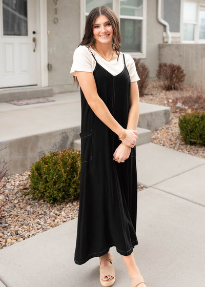 Front view of the black overall dress