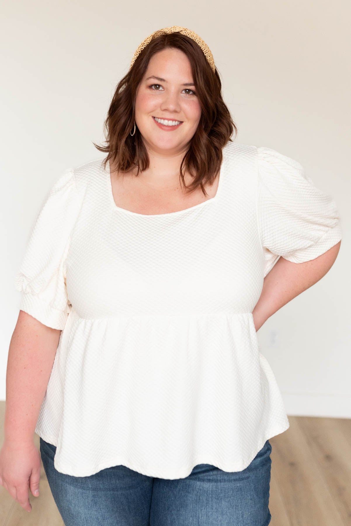 Short sleeve cream ruffle top in plus size