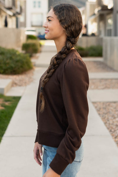 Side view of the brown pullover