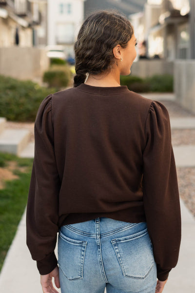 Back view of the brown pullover