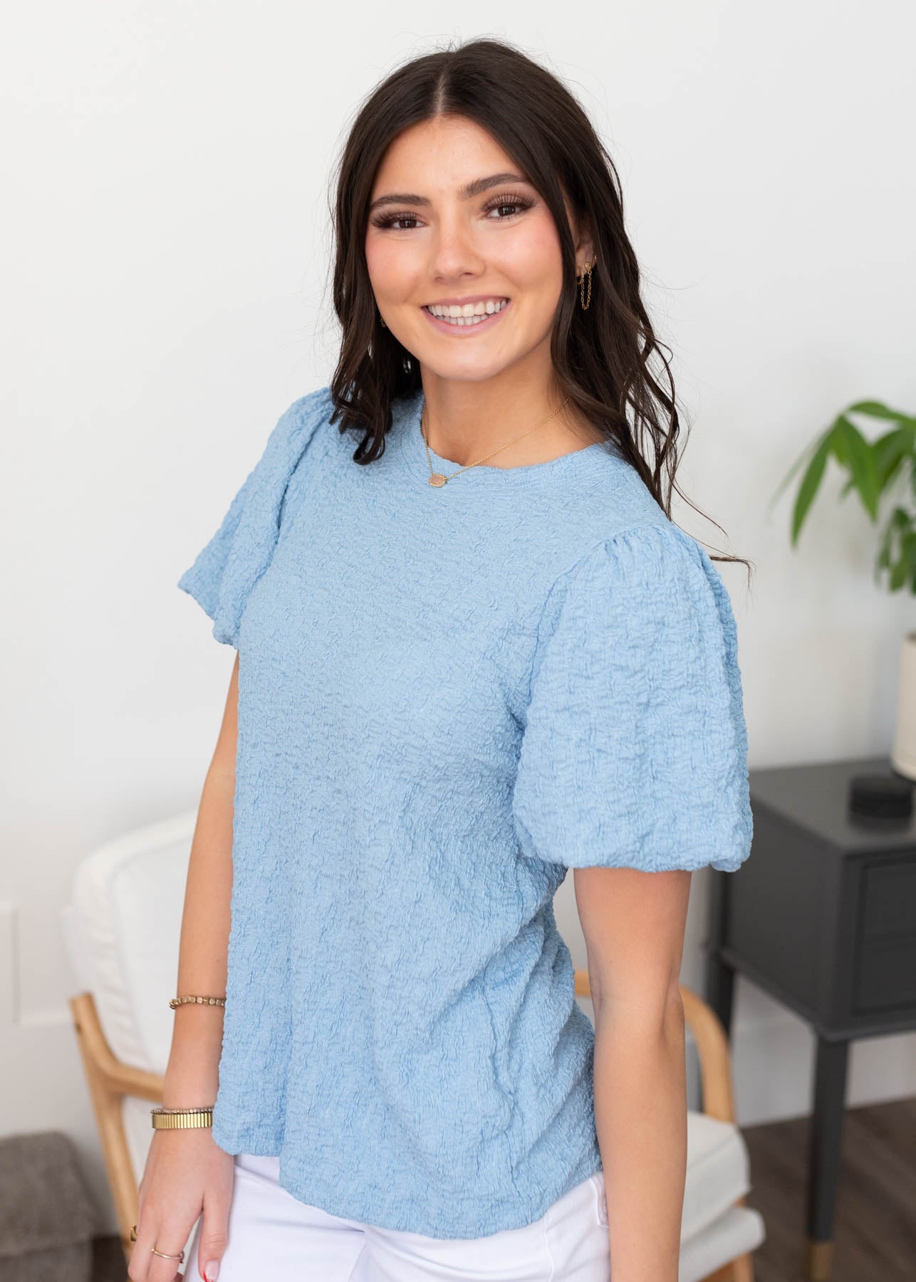 Puff sleeve on the blue textured top