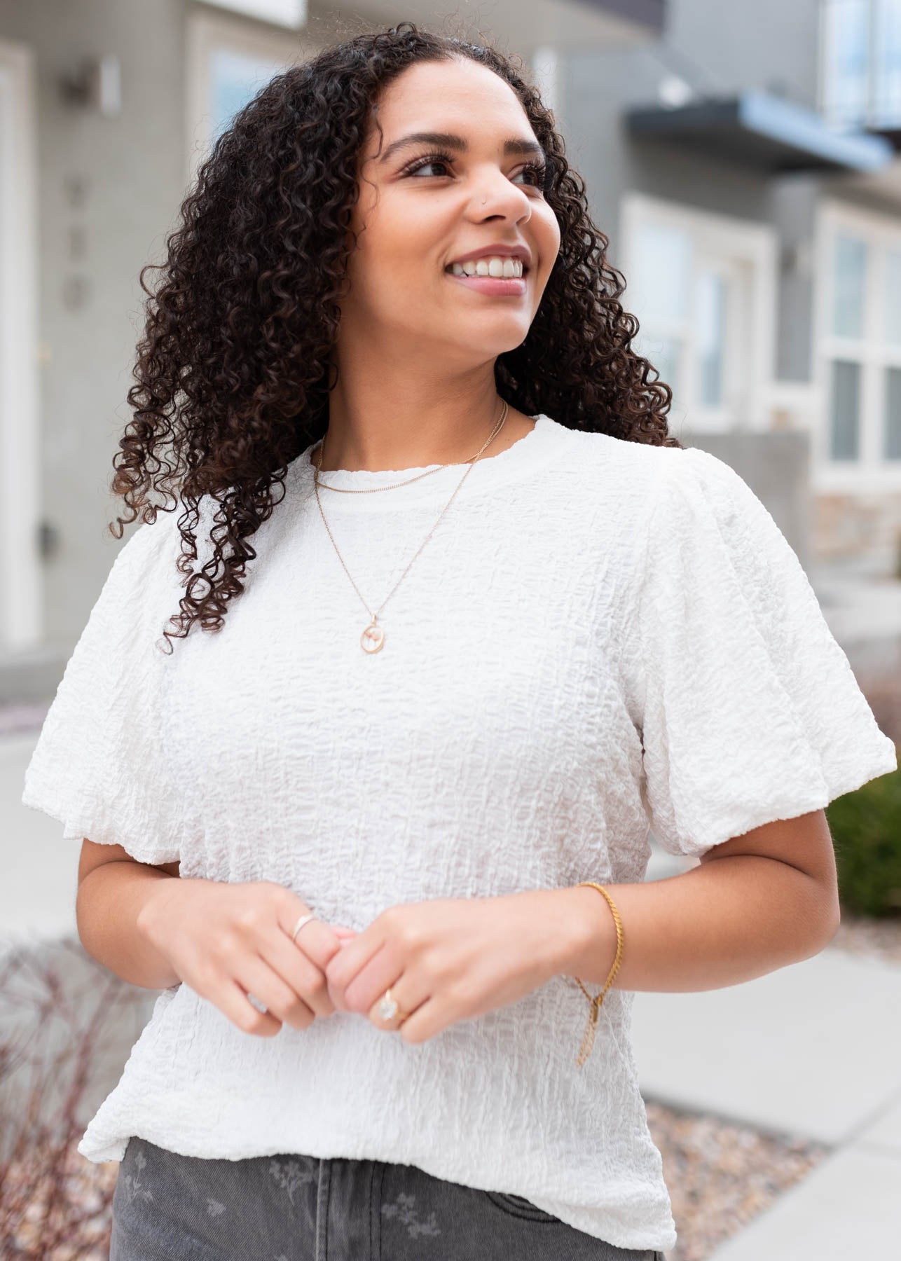 Ivory textured top with short puff sleeves