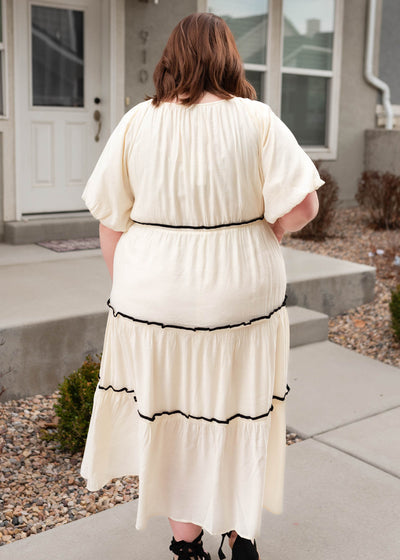 Back view of the cream ruffle tiered dress in plus size