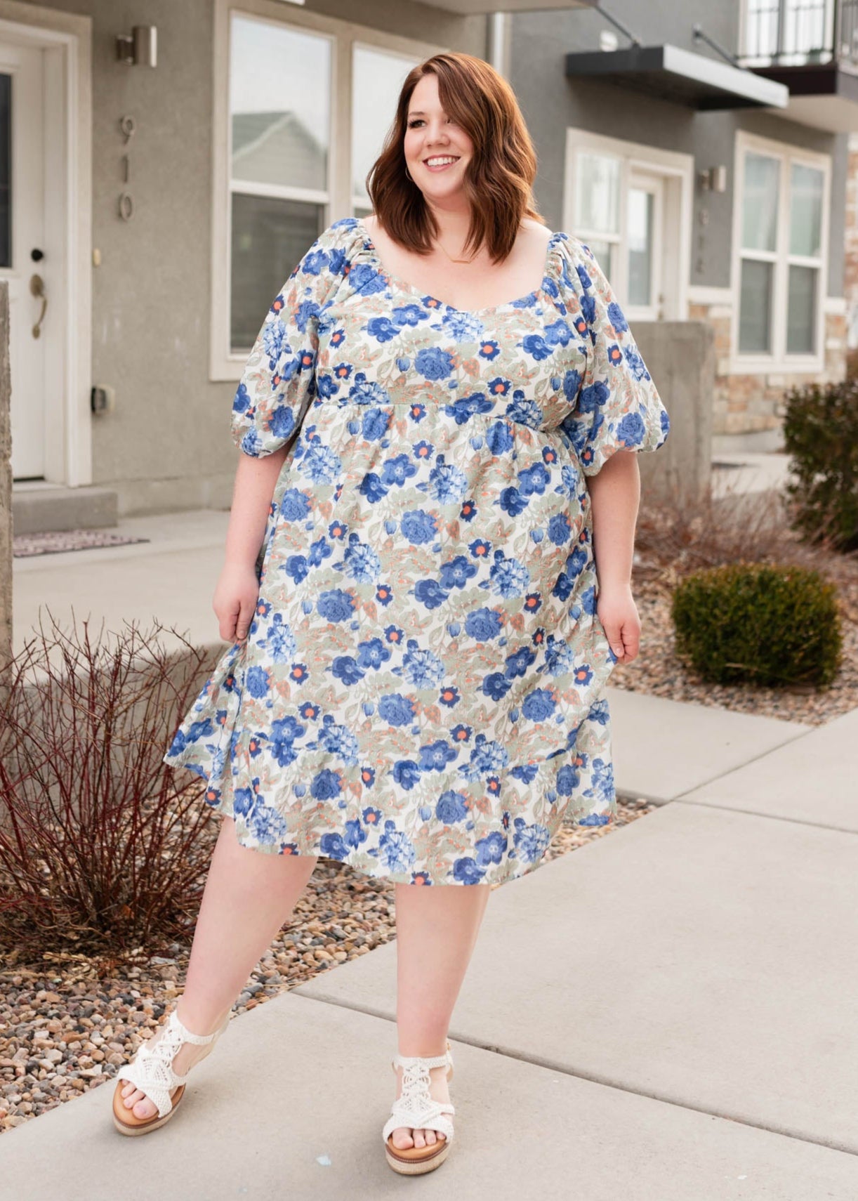 Plus size blue floral dress with a sweatheart neck