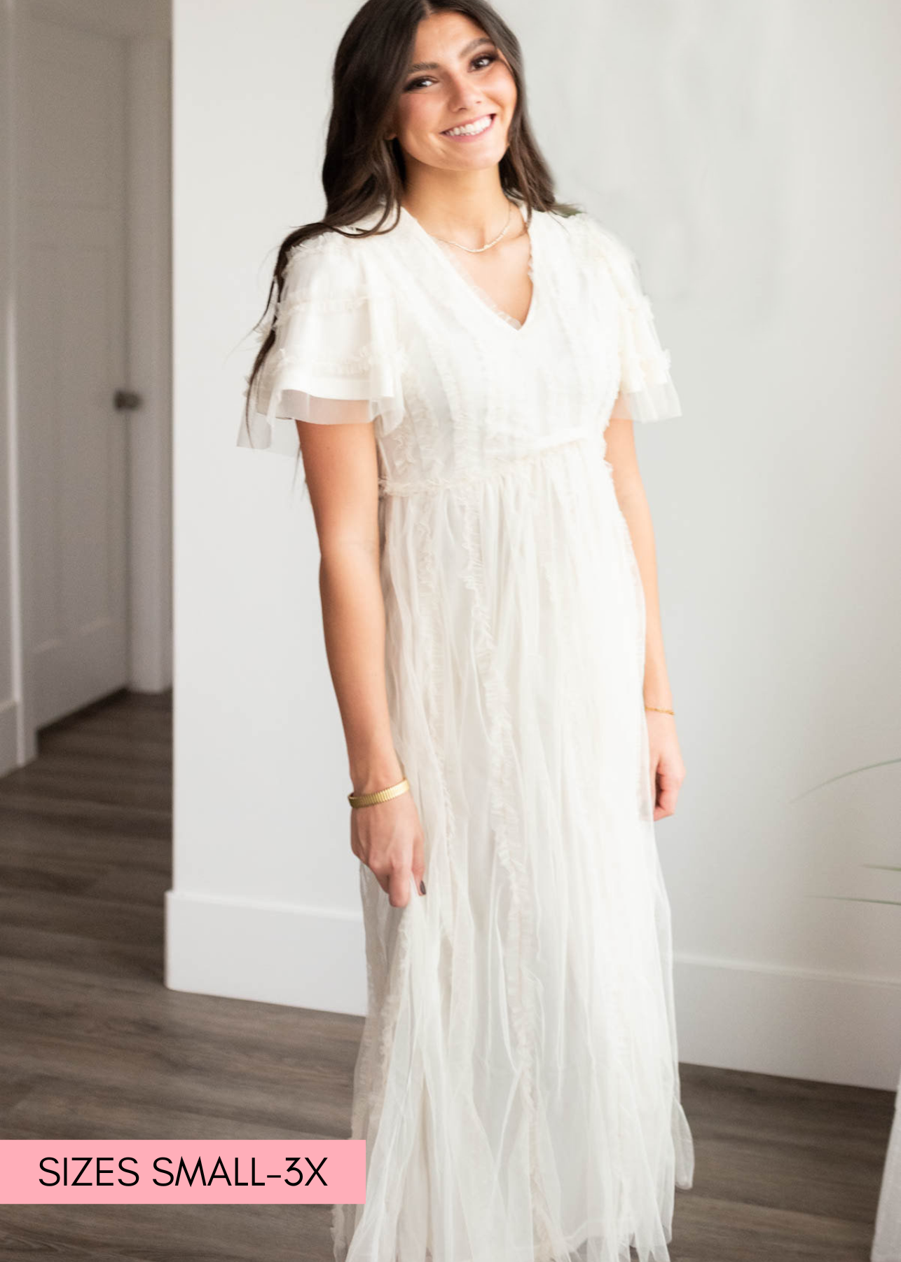 Cream sheer ruffle dress with a v-neck