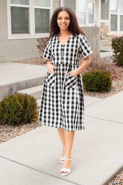 Black gingham button dress with buttons on the bodice