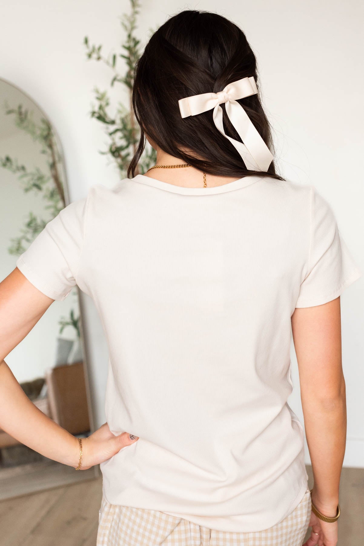 Back view of the cream ribbed top