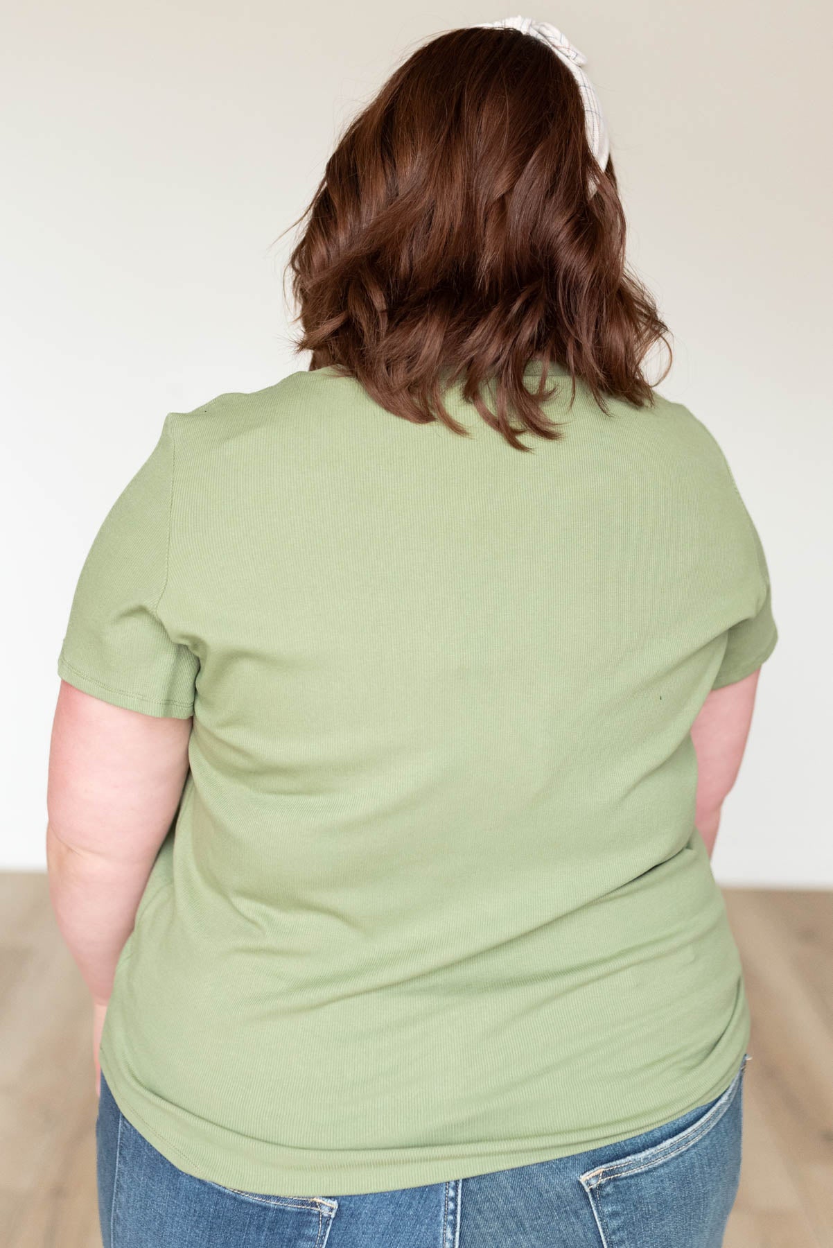 Back view of the sage ribbed top in plus size