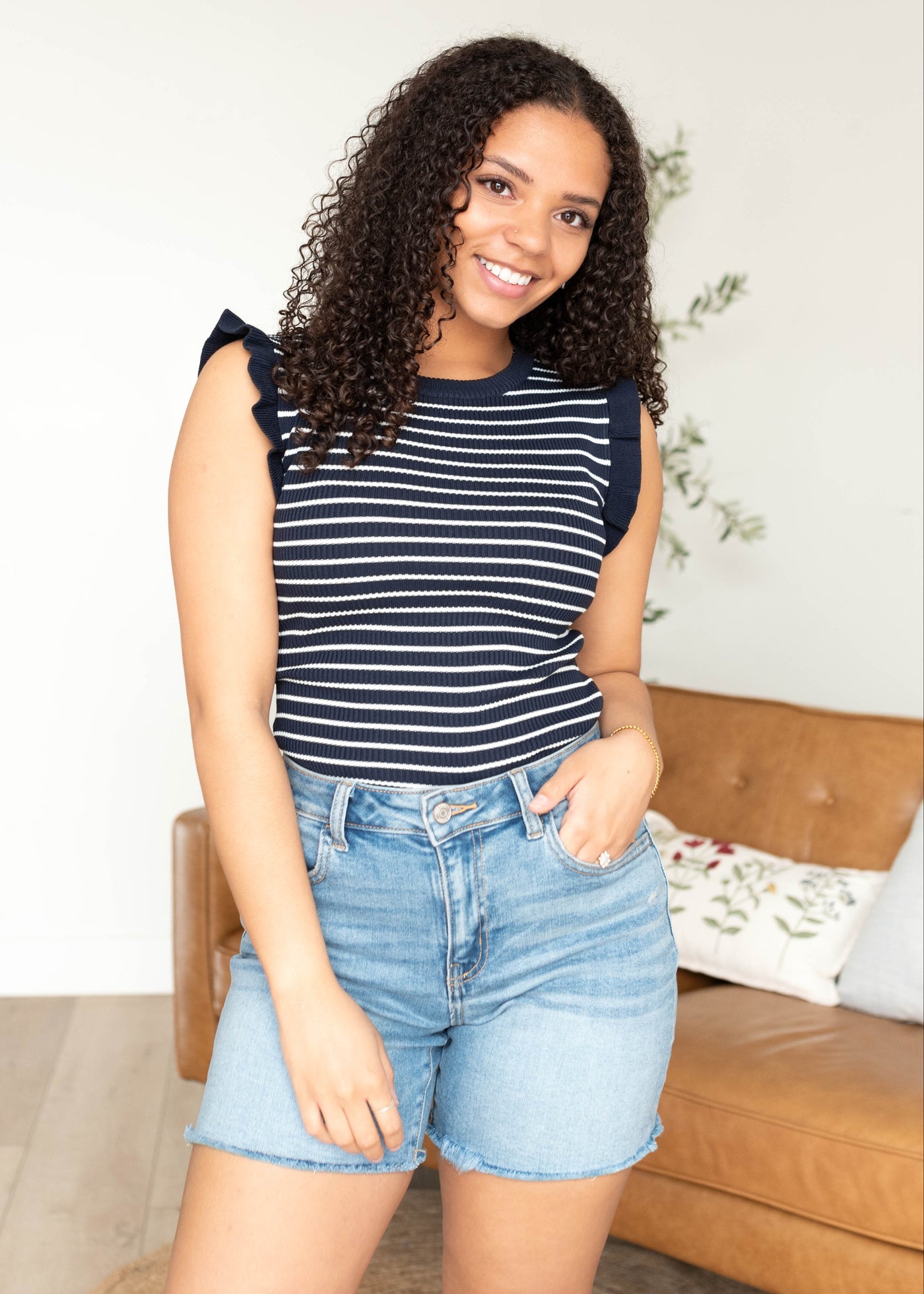 Navy sweater vest with ruffle on the sleeve