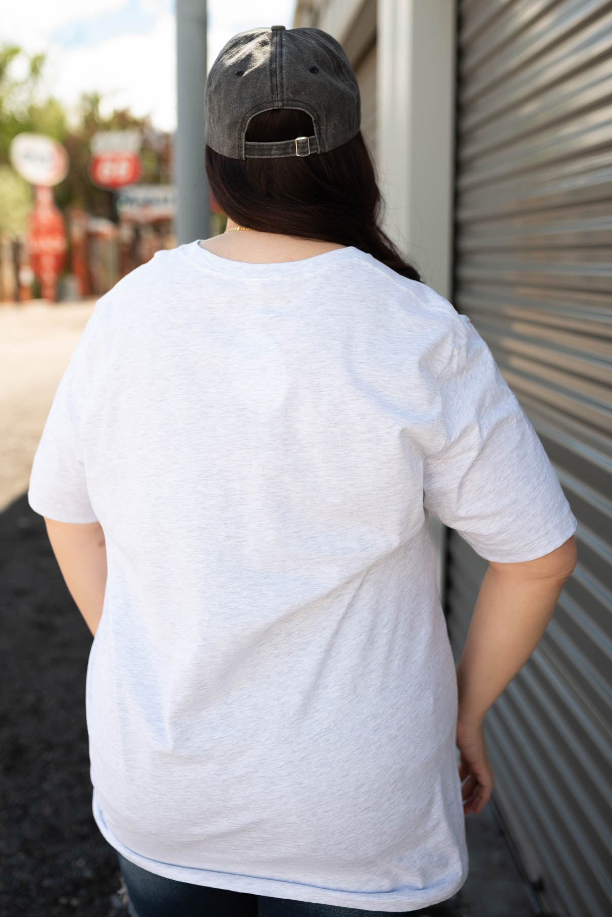 Back view of the plus size multi color wildflower tee