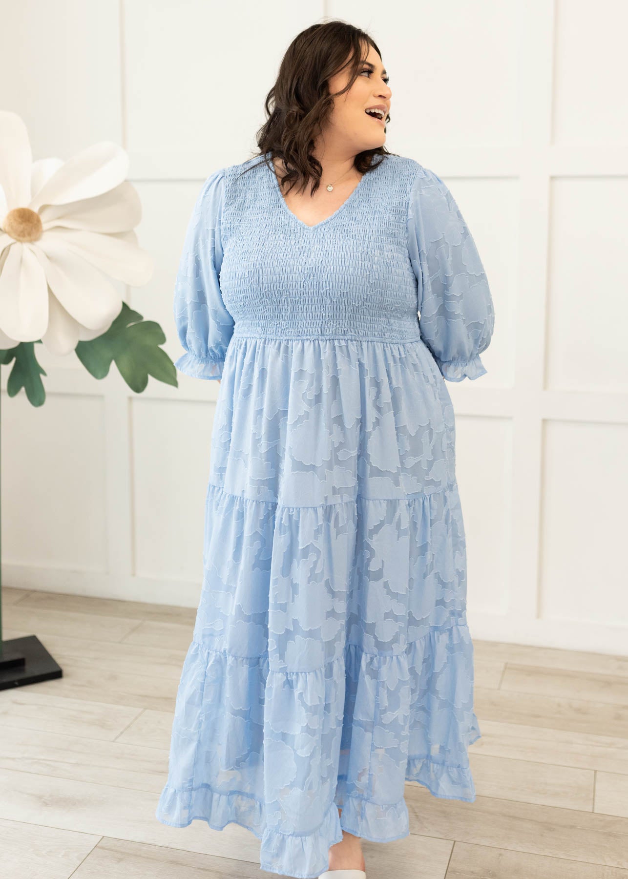 Blue floral tiered dress with short sleeve and v-neck in plus size