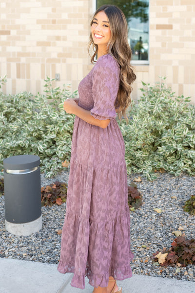 Side view of the dusty lilac floral dress