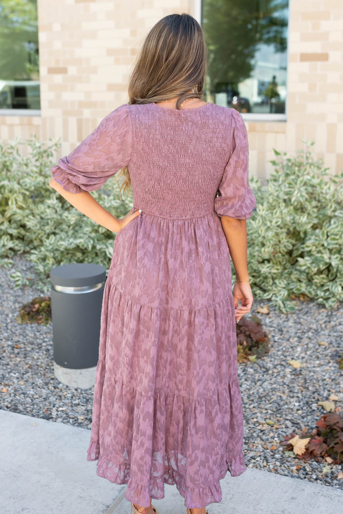 Back view of the dusty lilac floral dress