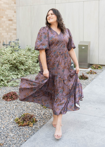 Front view of the plus size plum floral tiered dress 