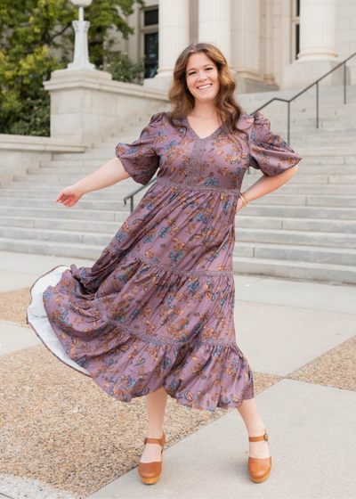 Plus size purple floral tiered dress with short sleeves