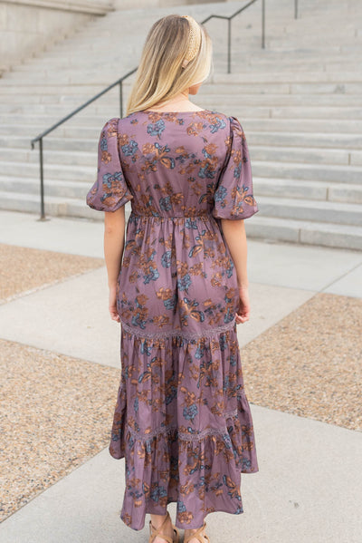 Back view of the purple floral tiered dress