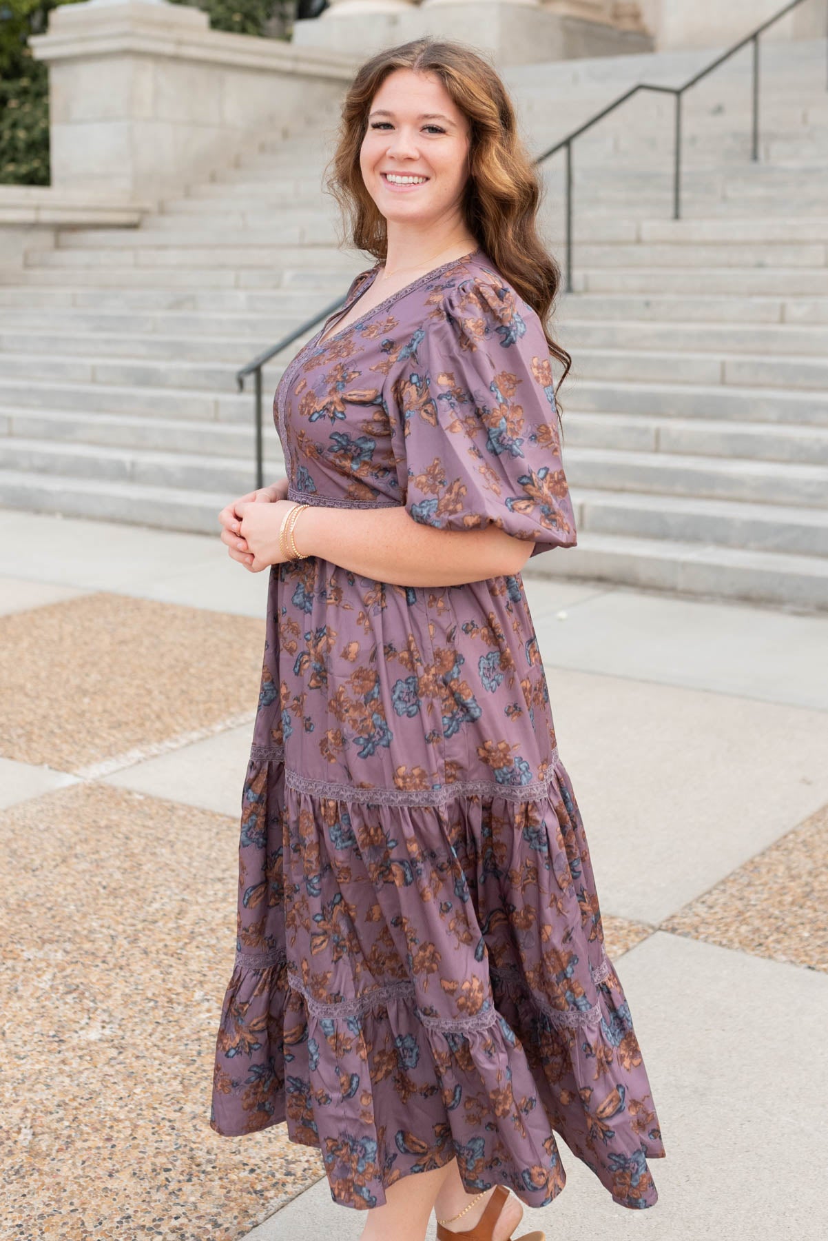 Side view of the purple floral tiered dress in plus size