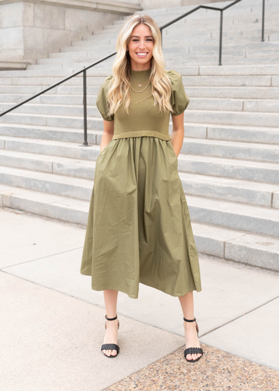 Side view of the olive knit bodice dress