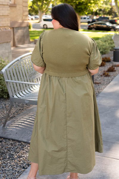 Back view of the plus size olive knit bodice dress