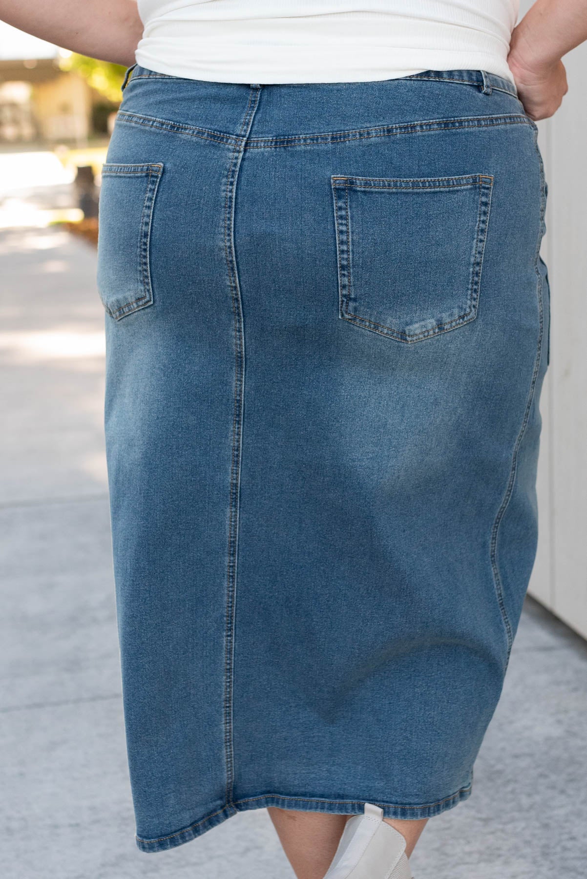 Back view of the plus size indigo pencil skirt