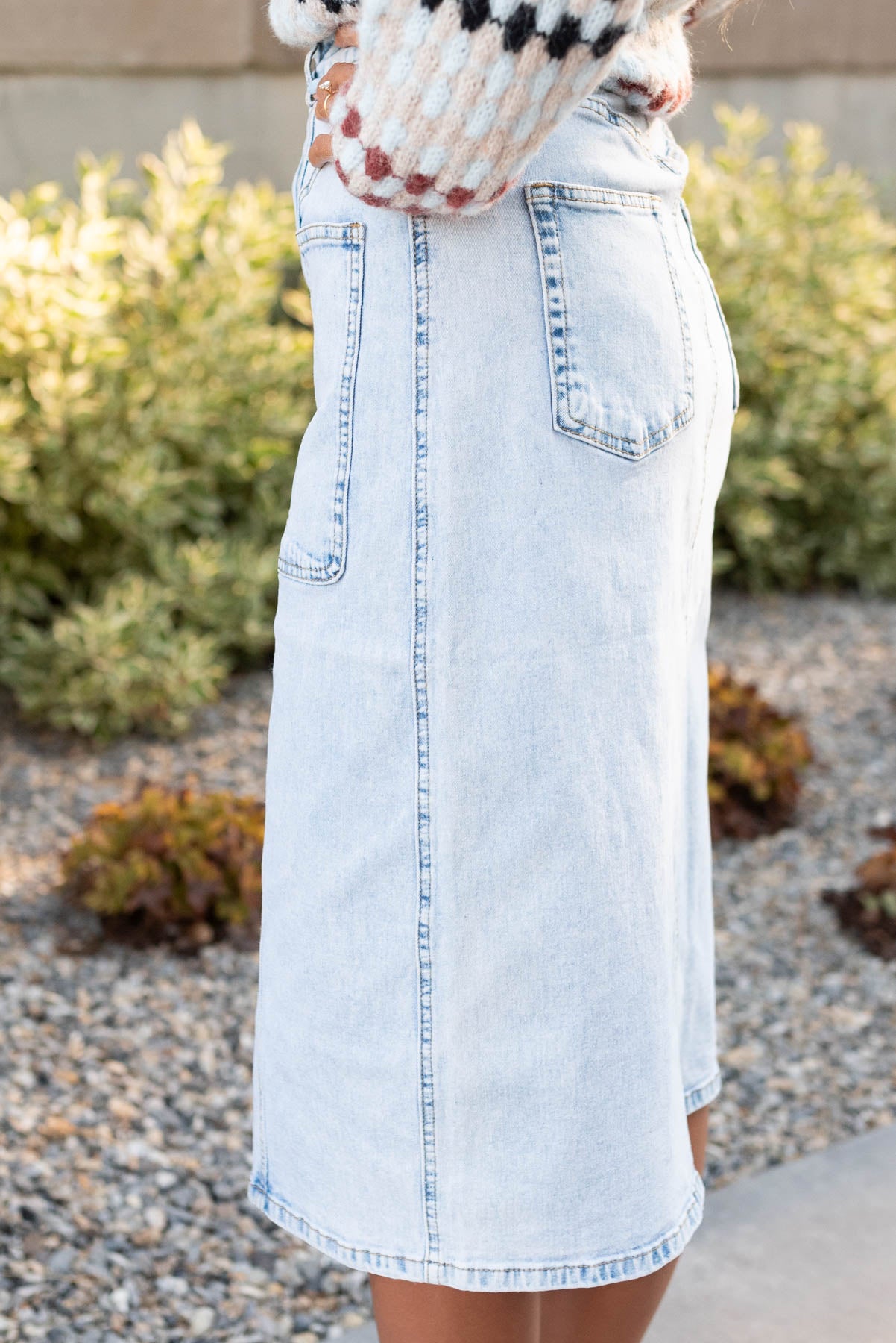 Side view of the light denim pencil skirt