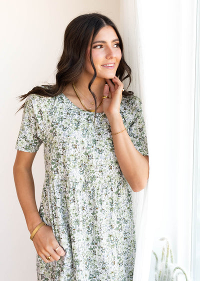 Short sleeves on the green flroal tiered dress