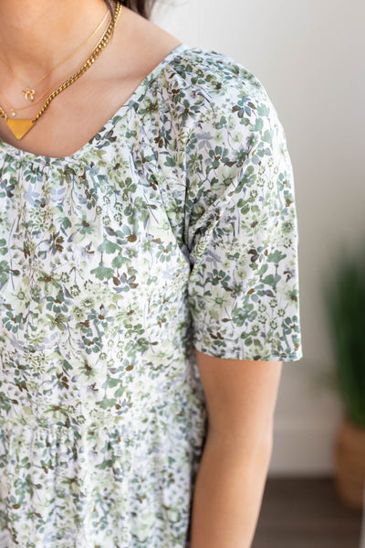 Close up of the sleeve on the green floral tiered dress