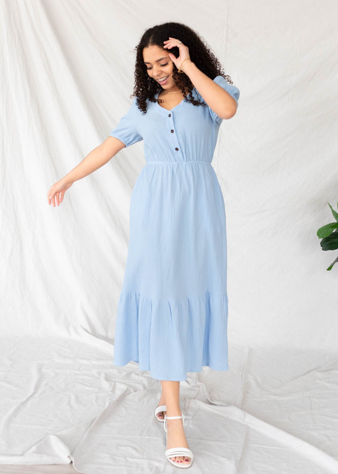 Blue gauze dress with a button bodice