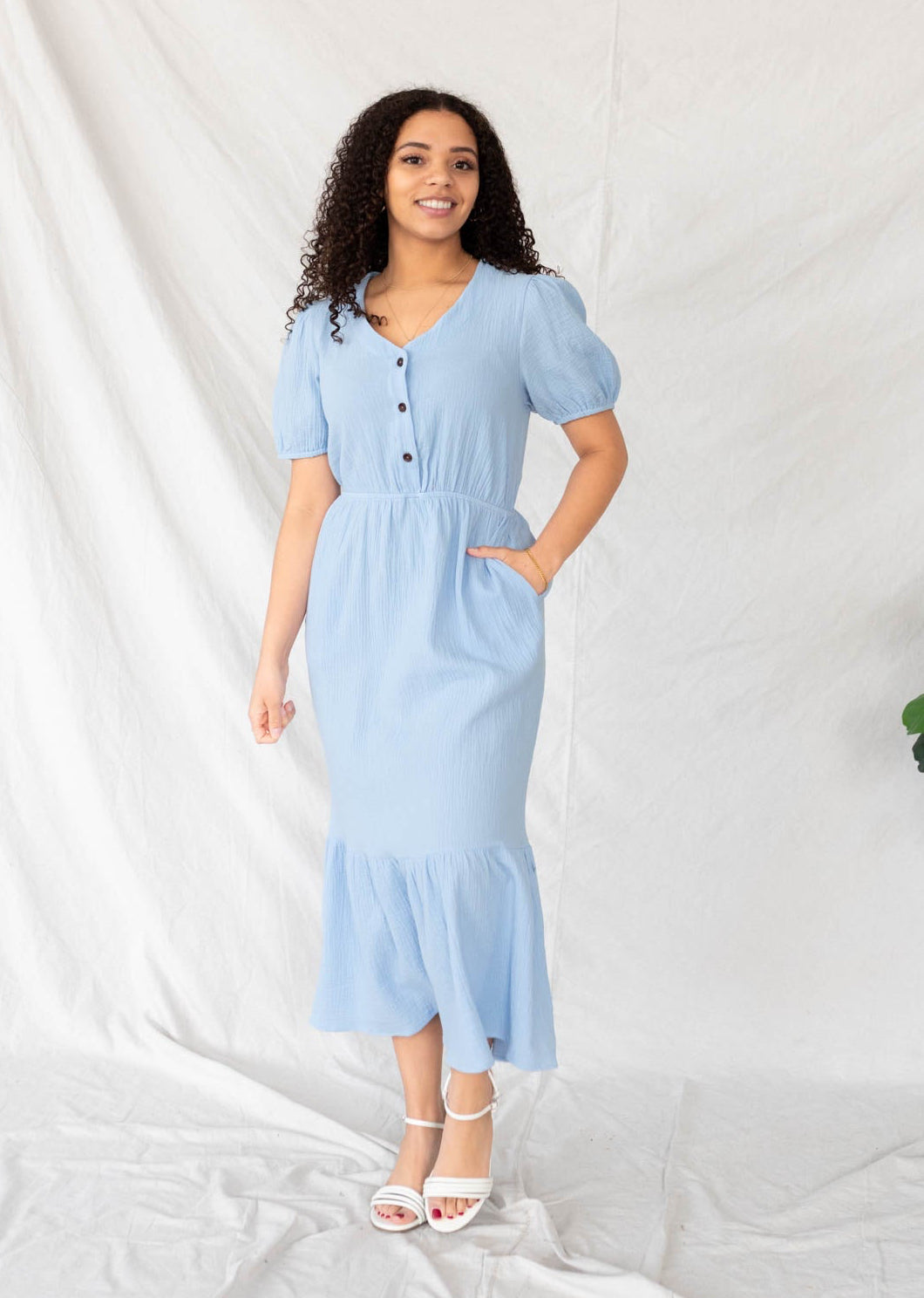 Blue gauze dress with pockets and button up bodice