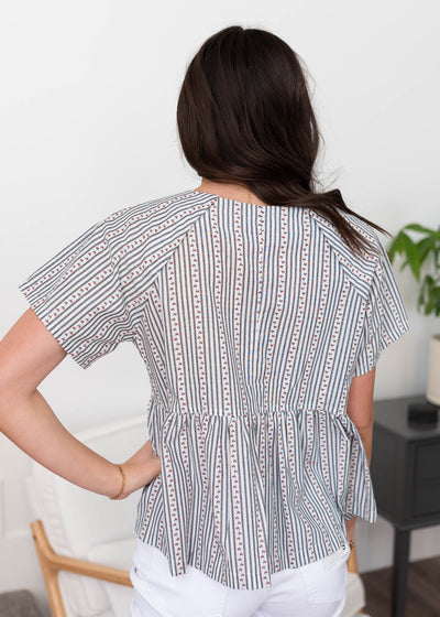 Back view of the blue pattern blouse