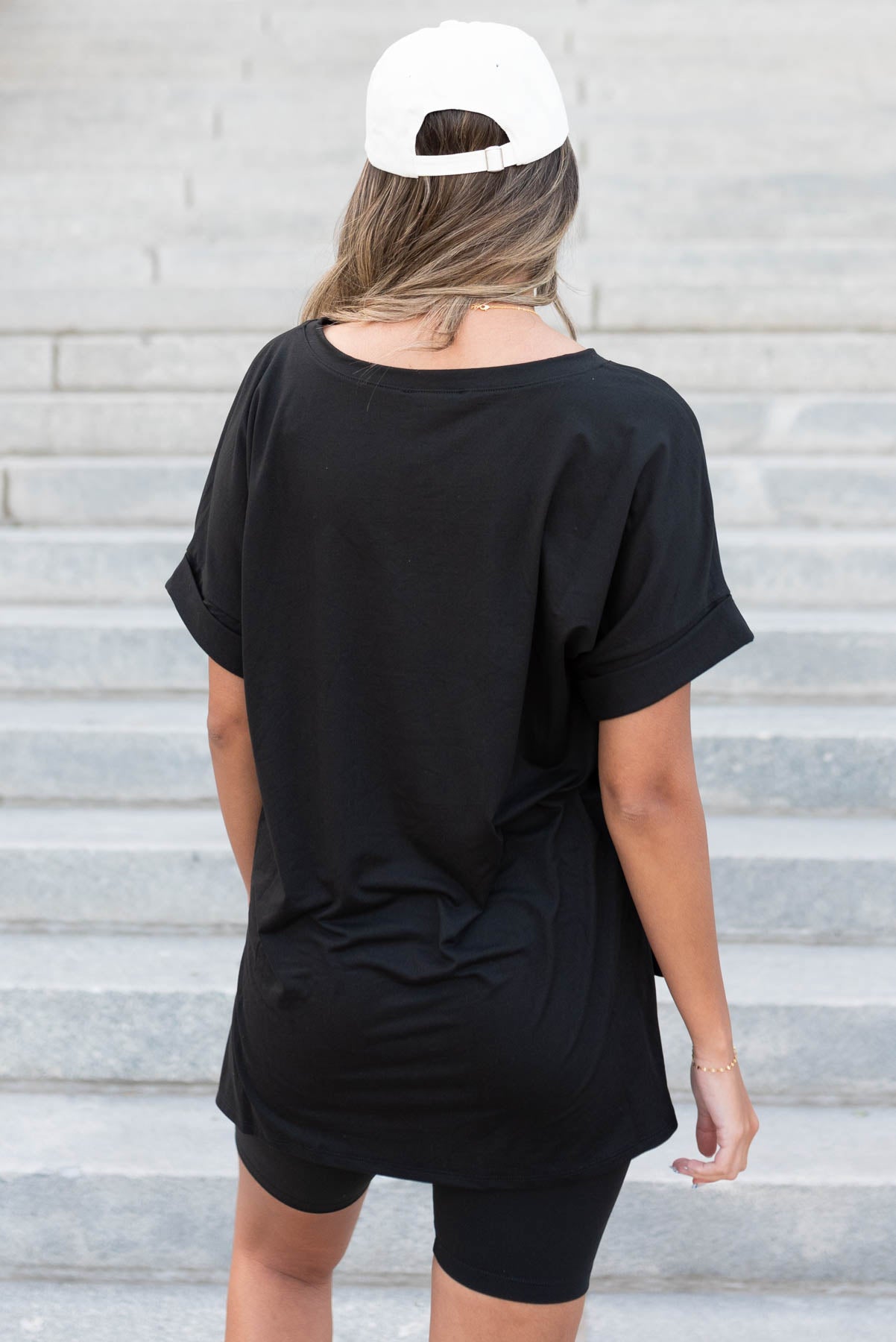 Back view of a black set with top and shorts