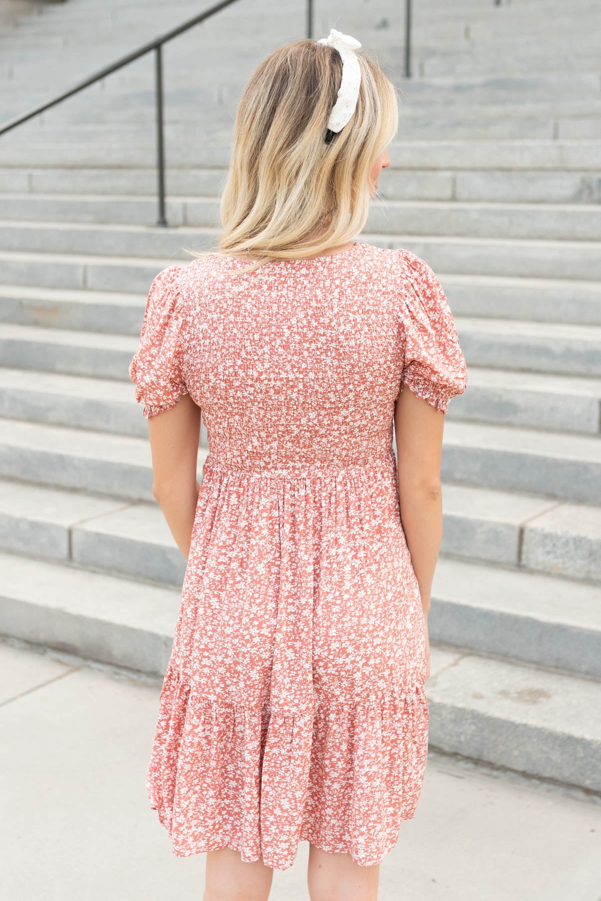 Back view of the coral floral mini dress