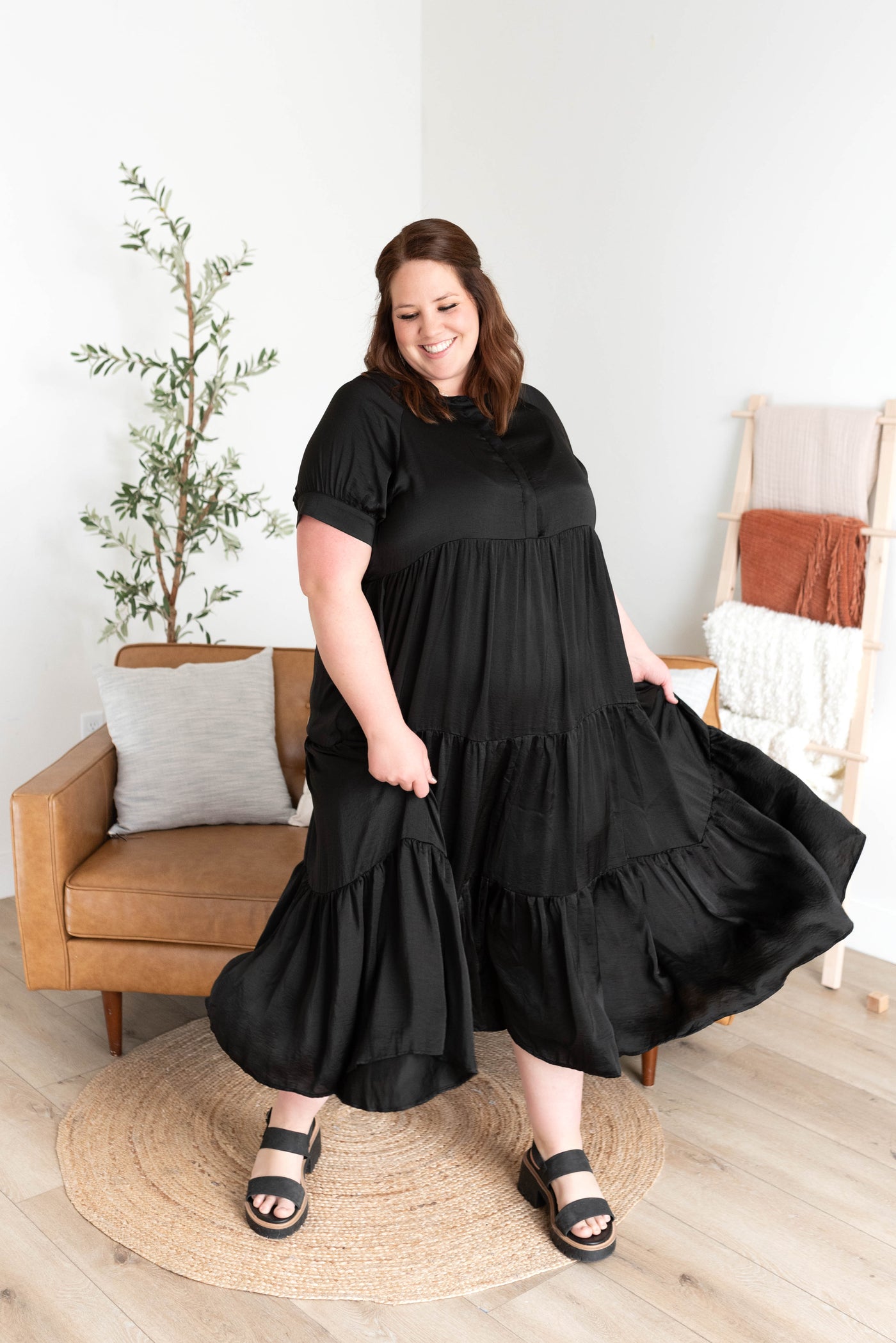 Button up bodice on the black satin dress in plus size